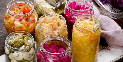 collection of fermented food in mason jars
