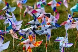 image of pinwheels in a grassy area