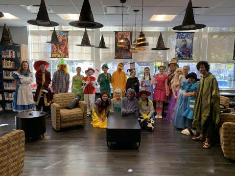 image of student volunteers dressed in Halloween costumes