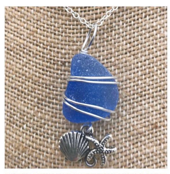 Sea glass pendant with charm